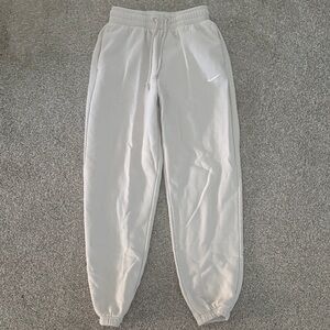 Nike Women’s Phoenix Fleece Joggers in Sail/Coconut Milk (light cream)